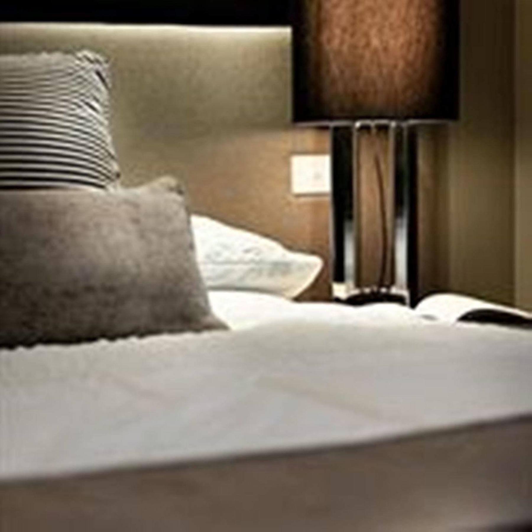 Fraser Suites Perth Exterior photo A bed